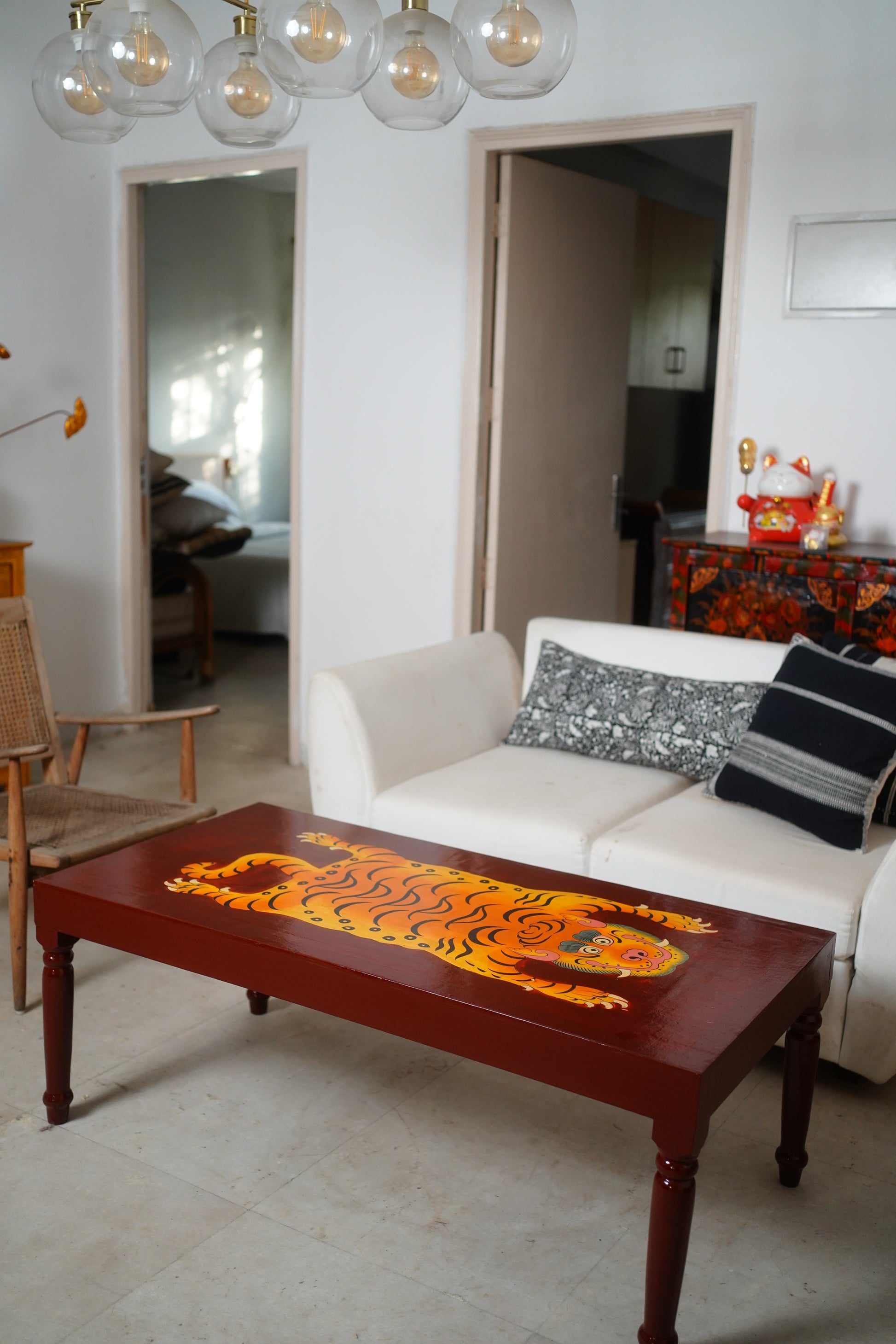 CHINWA HAND PAINTED COFFEE TABLE - BROWN AND RUST
