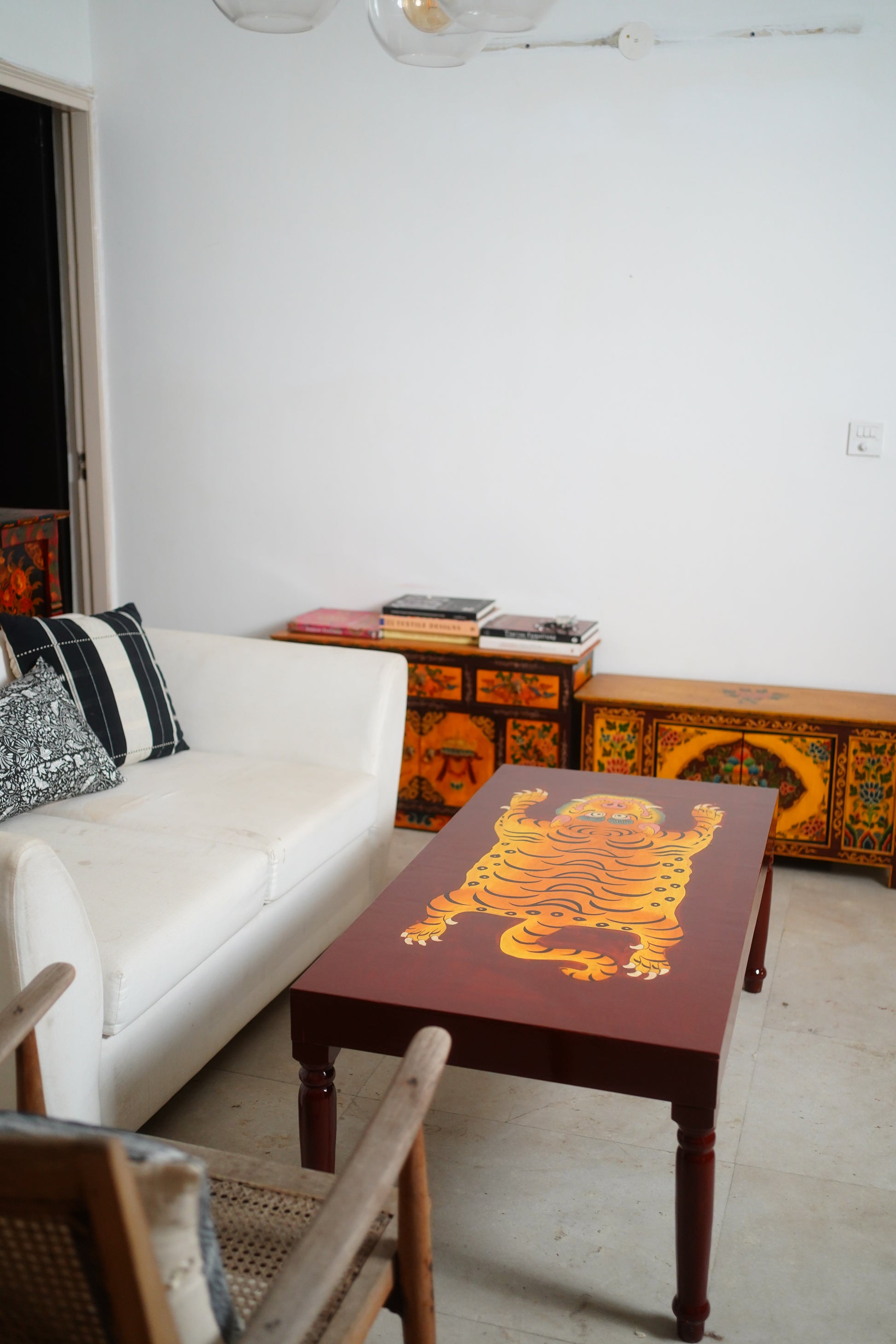 CHINWA HAND PAINTED COFFEE TABLE - BROWN AND RUST