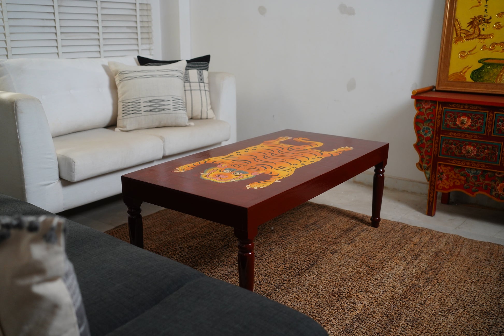 CHINWA HAND PAINTED COFFEE TABLE - BROWN AND RUST