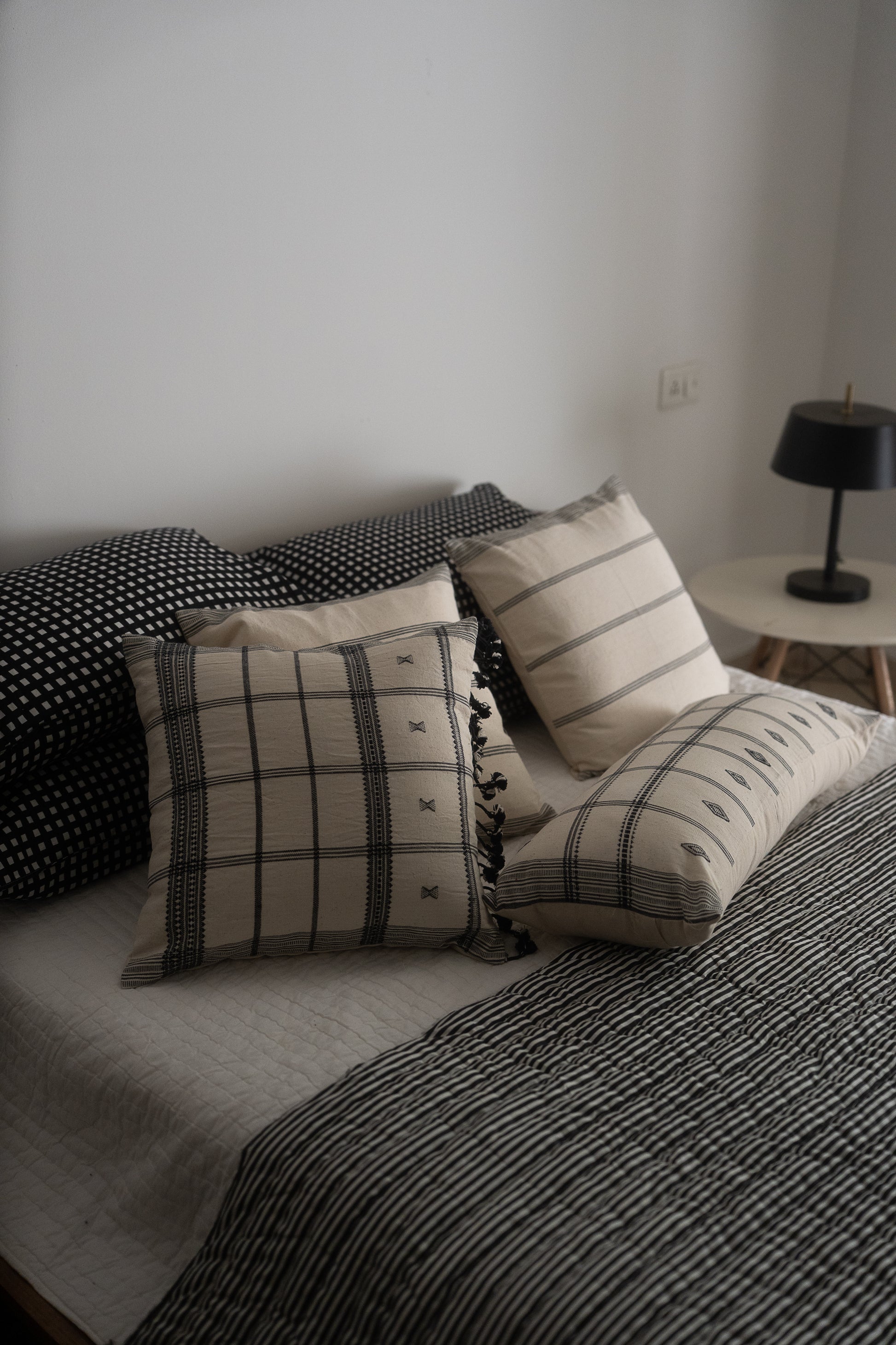 BHOMA HANDWOVEN CUSHION - MONOCHROME